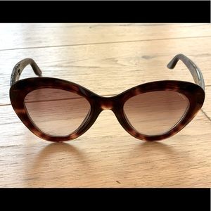 Lapima, tortoise shell Rita sunglasses and case.